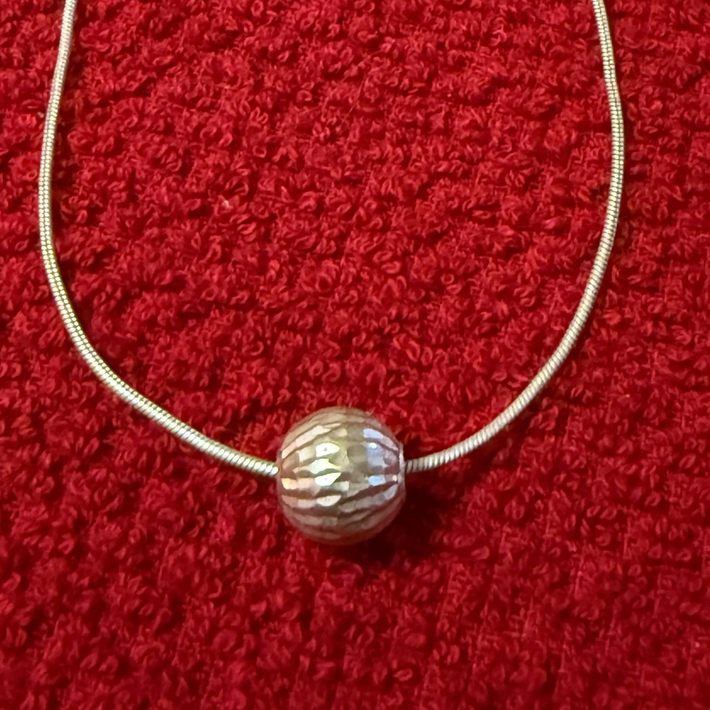 Sterling Silver Snake Chain with 10mm diamond cut bead.